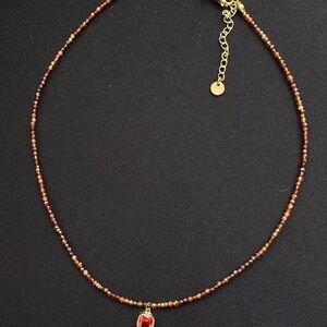 Elegant Beaded Necklace with Gold Accents